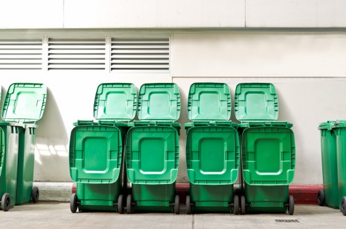 Construction site with organized waste clearance in Shadwell