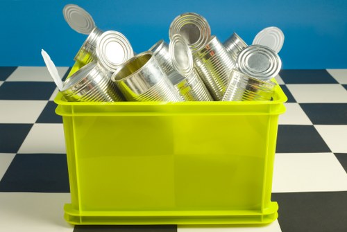 House clearance professionals organizing items in a Shadwell home